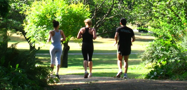 Exercising with a friend in the park, or keeping fit with a running partner