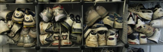 Dozens of pairs of sneakers, crammed into gym lockers